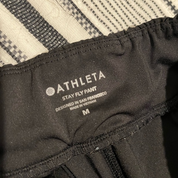 Athleta Stay Fly Black Zipper Nylon Track Pant Size Medium Gently Worn - Picture 9 of 11